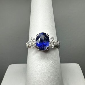 NWOT 1.86ct genuine blue sapphire with .12ctw of diamonds, 18k white gold ring!